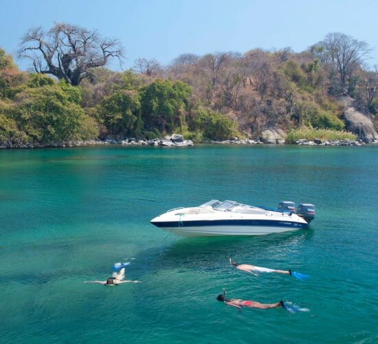 family snorkelling in Malawi