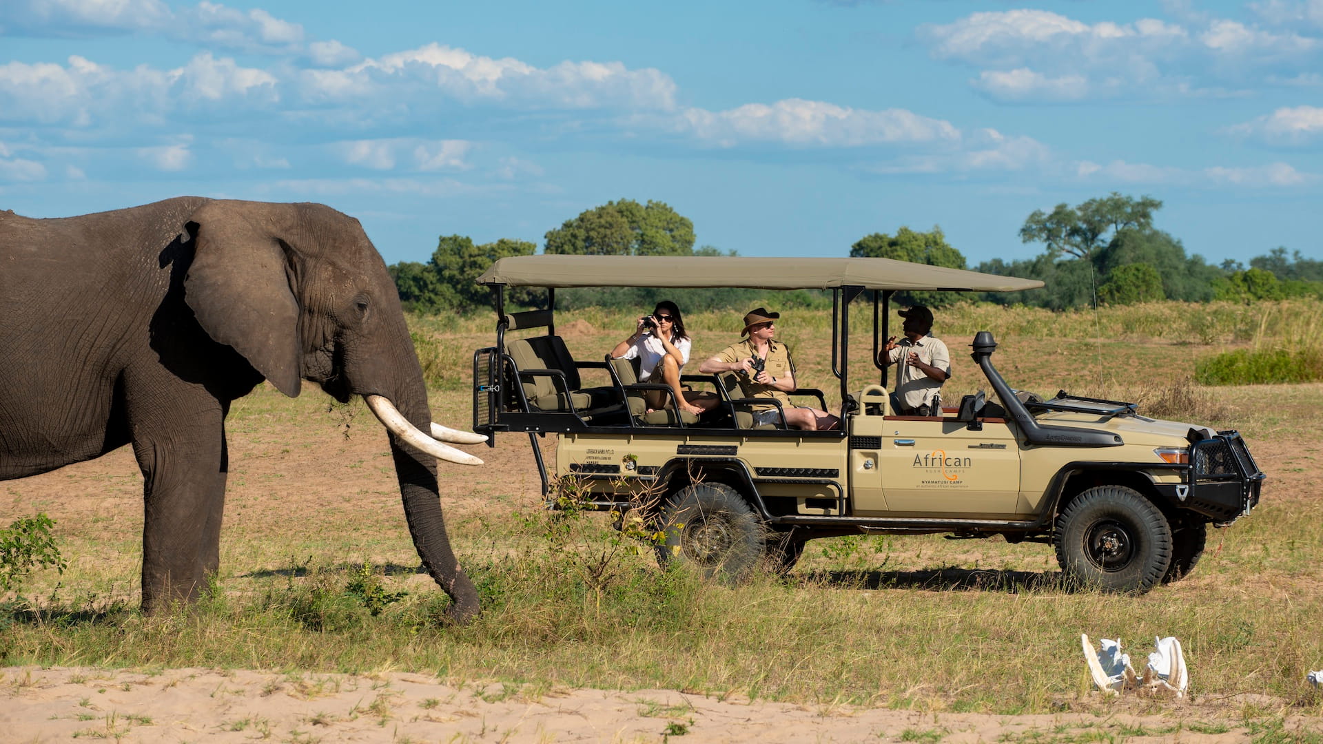 Couple on safari African Bush Camps Nyamatusi