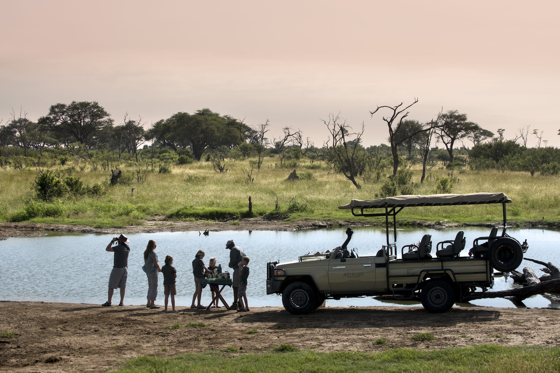 family on african safari